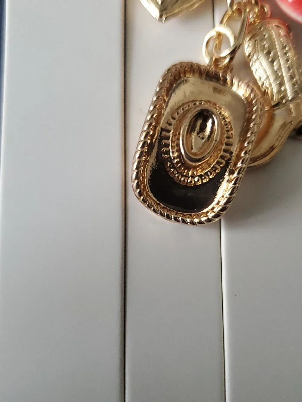 Lane Bryant Gold-Tone Charm Keychain with Red and Blue Accents